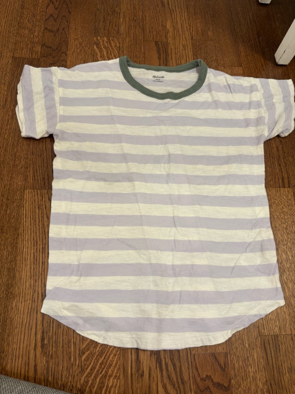 Purple and white striped tee with green collar